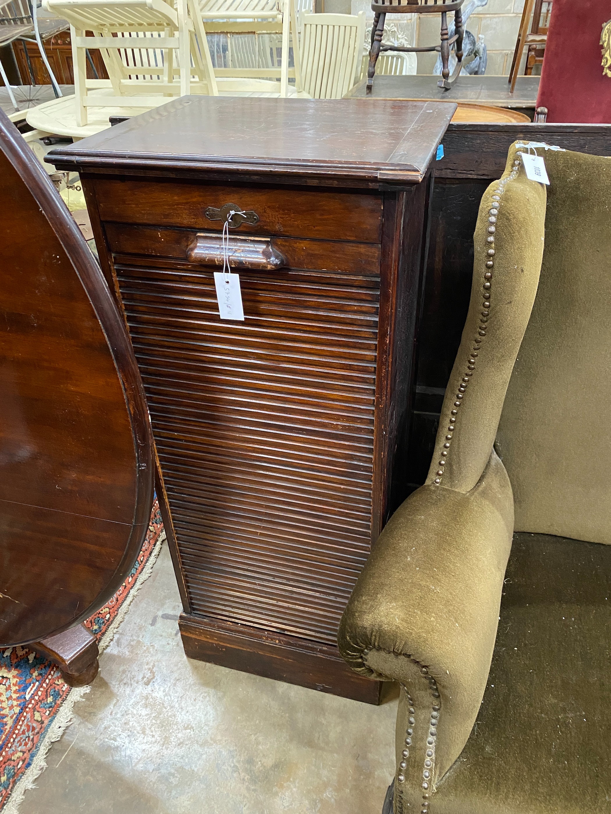 An early 20th century mahogany tambour shutter filing cabinet, width 49cm, depth 43cm, height 116cm